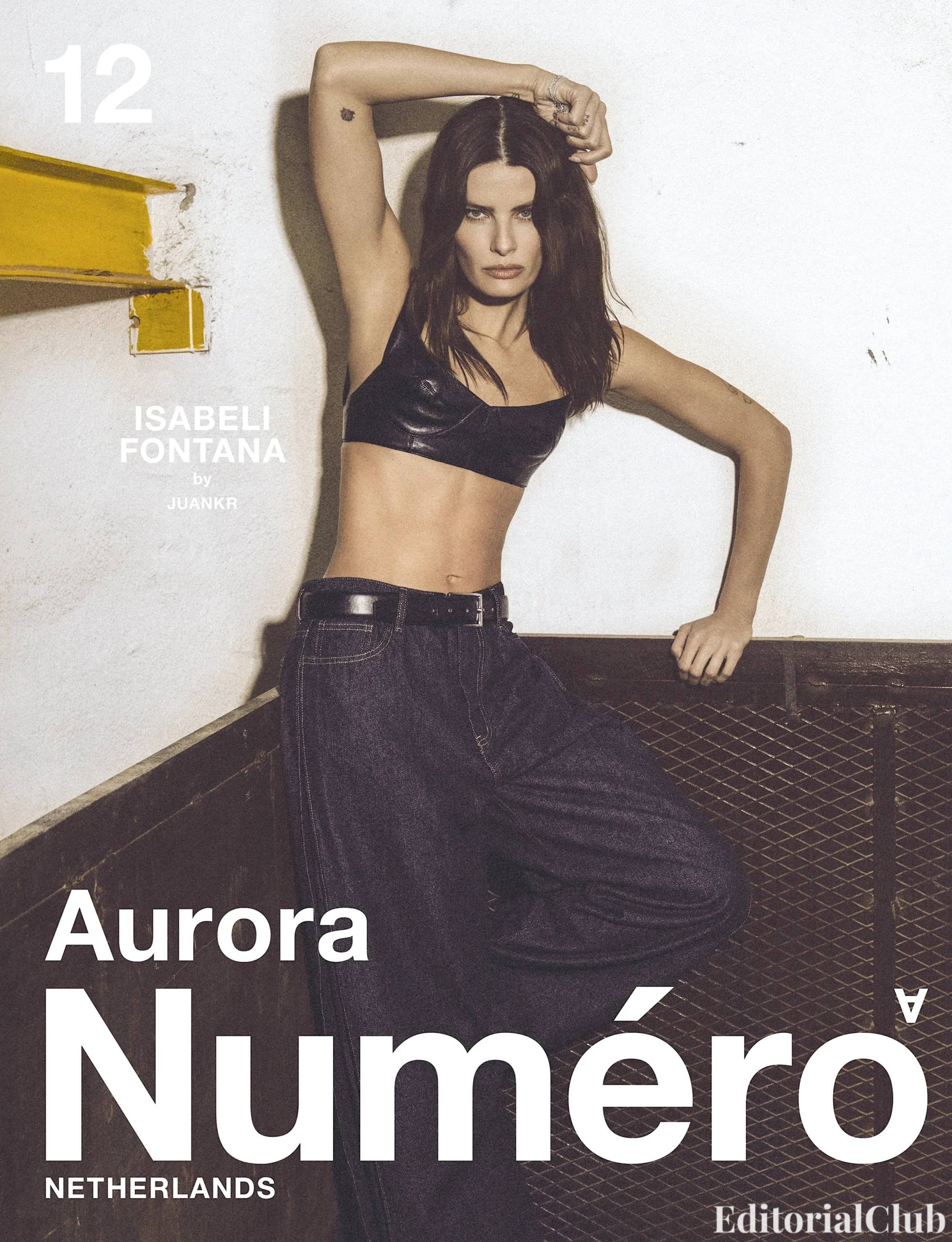 Cover of Numéro Netherlands May 2025 featuring Isabeli Fontana in a leather crop top and wide-leg jeans, shot by JUANKR.