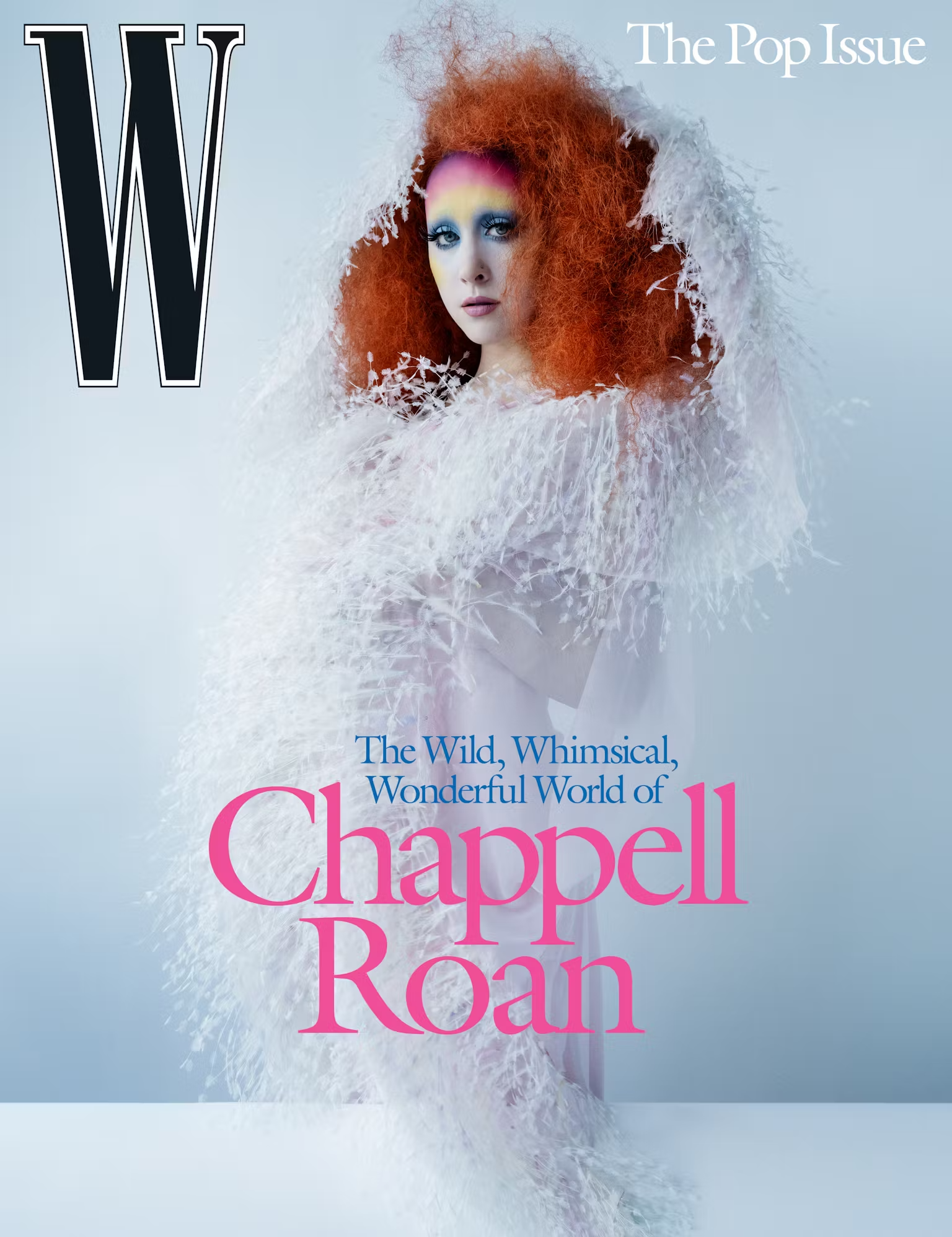 Chappell Roan graces the cover of W Magazine's Pop Issue in May 2025, wearing a dramatic feathered white gown and bold rainbow eyeshadow with her signature voluminous red hair.