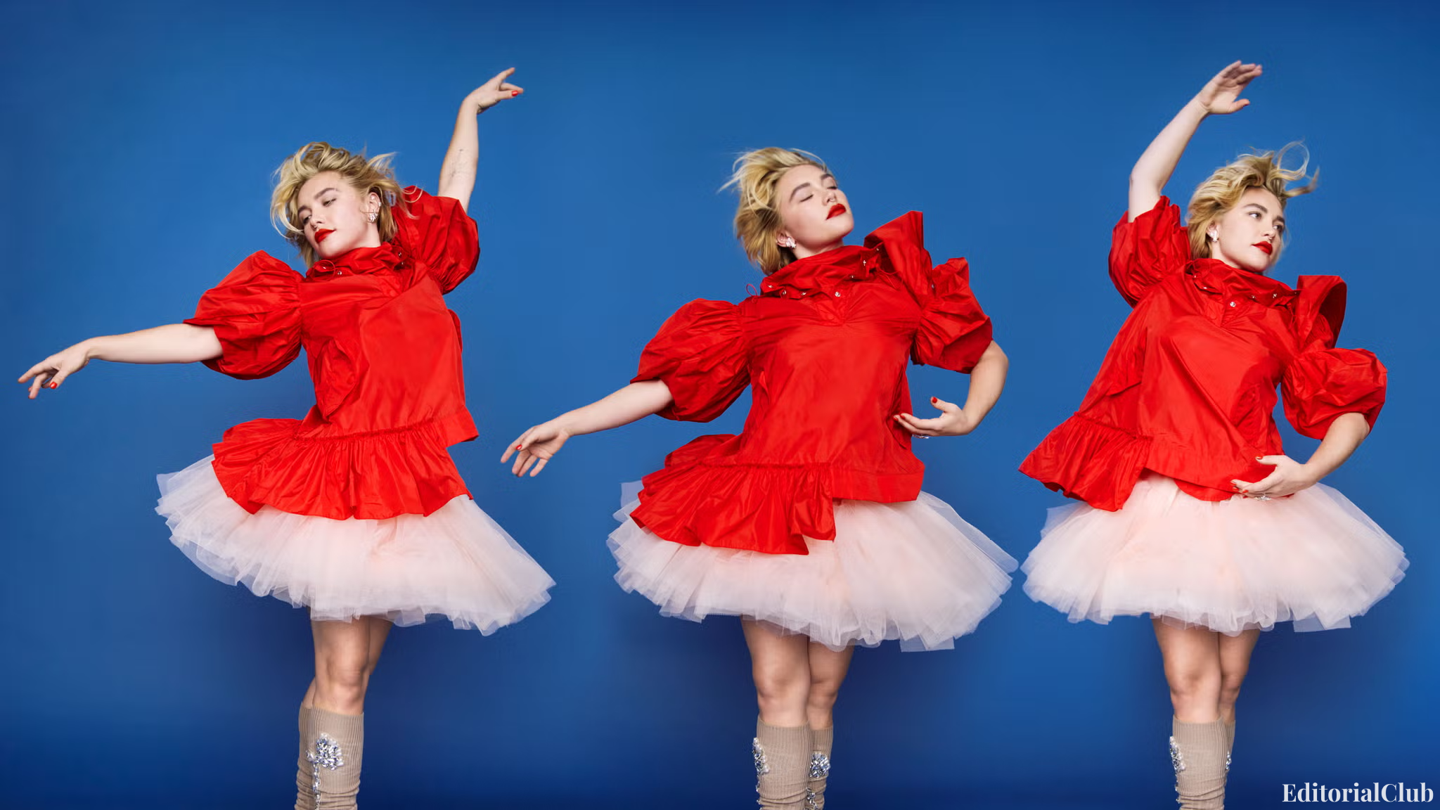 Florence Pugh in a red puff-sleeve blouse and tulle skirt, dancing gracefully against a blue backdrop.