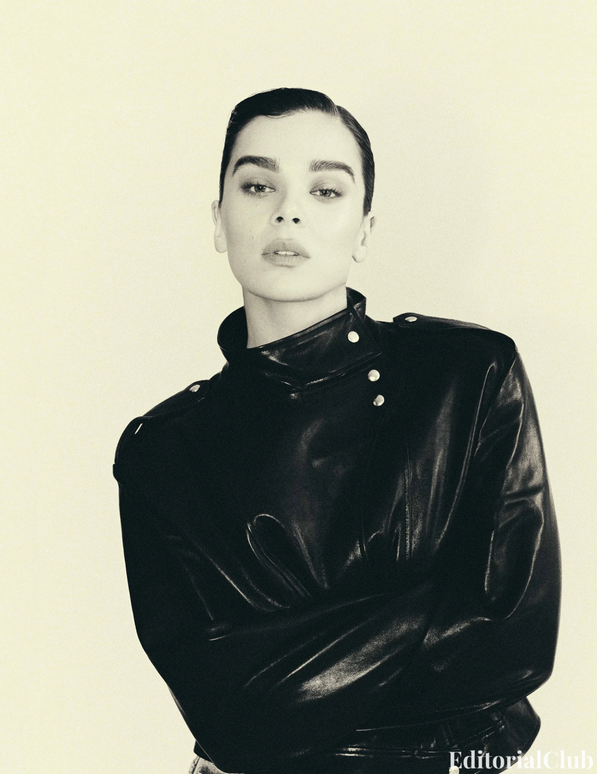 Hailee Steinfeld in a structured black leather jacket and sleek hairstyle for Flaunt Magazine March 2025.