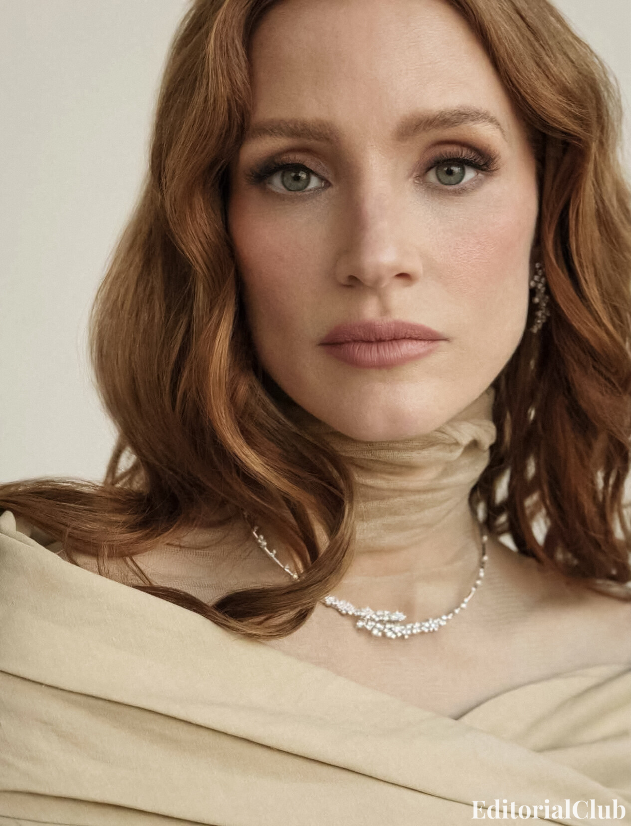 Jessica Chastain close-up in nude tulle wrap and diamond necklace – Elle Spain April 2025