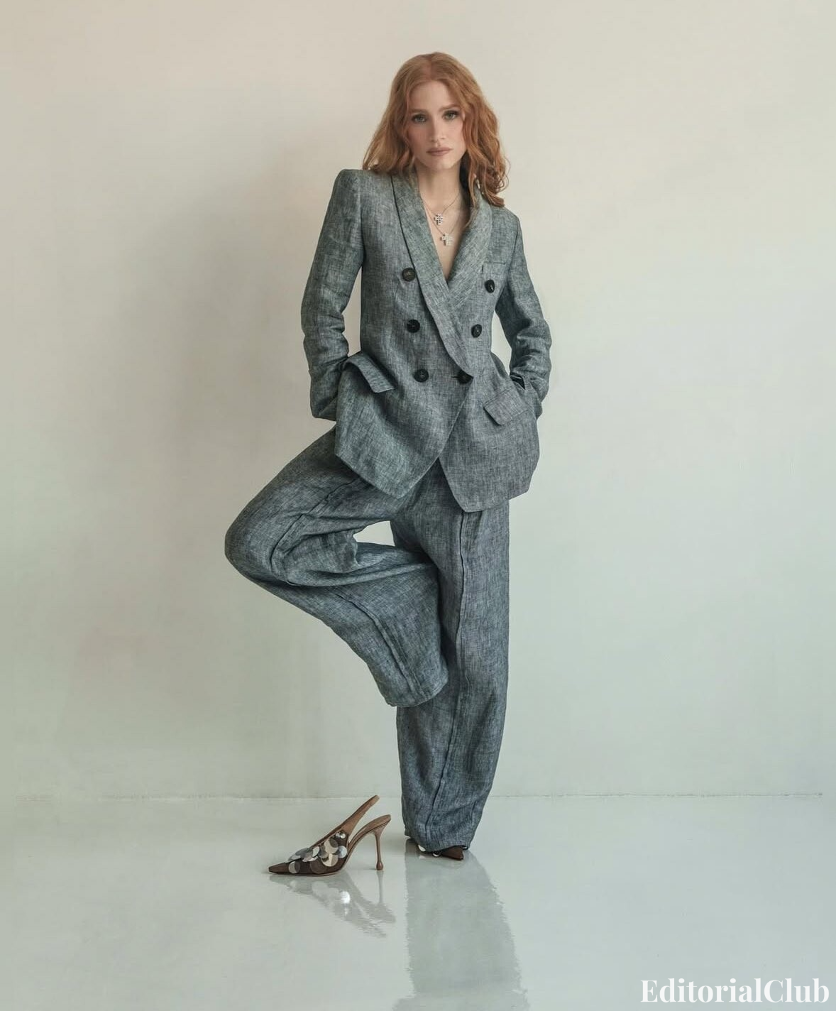 Jessica Chastain in oversized gray pantsuit with cross necklaces – Elle Spain shoot