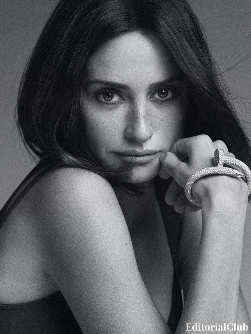 Close-up black and white portrait of Penélope Cruz with minimal makeup and sleek hair for InStyle 2021 editorial