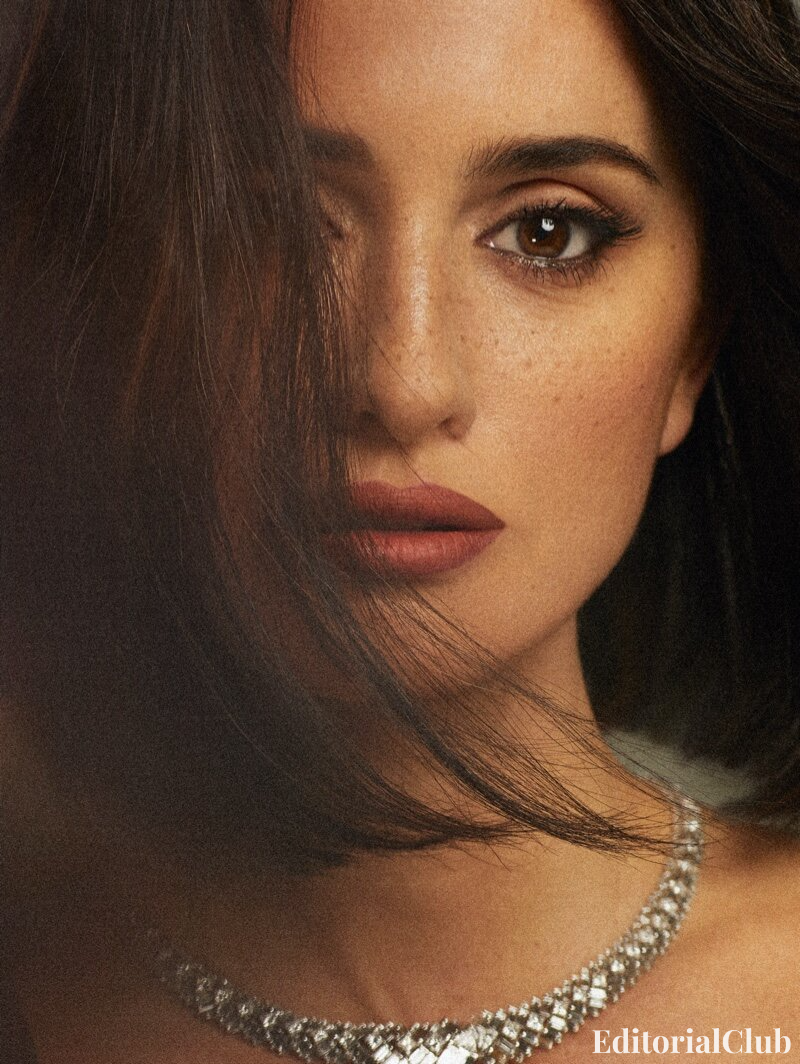 Cinematic close-up of Penélope Cruz's face with glossy lips and intense gaze for InStyle May 2021 editorial shoot